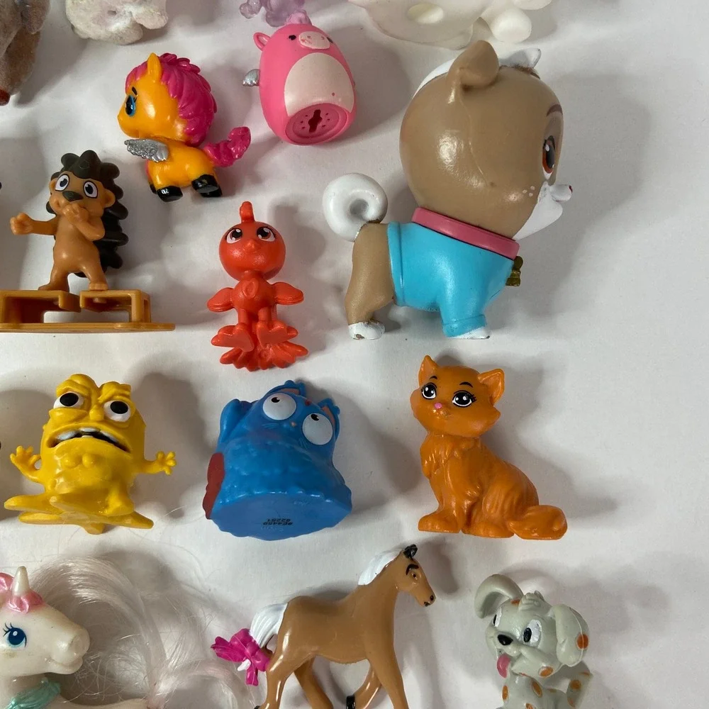 25 Piece Mixed Toy Figure Lot Animals Cinnamoroll Squishmallows Unicorn Monkey